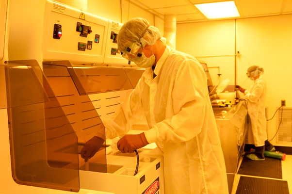 Graduate students clean and process semiconductor wafers in the wet benches. 