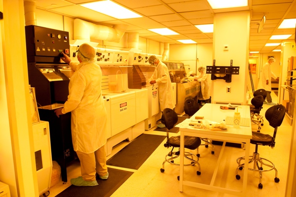Cleaning and processing semiconductor wafers in the wet work bay. 