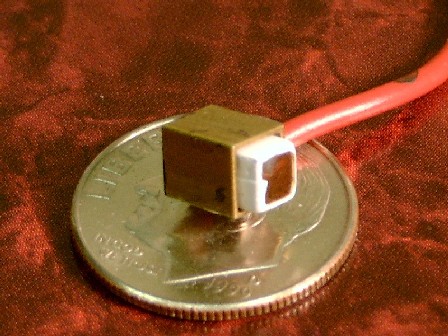 CdZnTe planar detector after insertion into the metal Frisch Collar.
