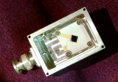 A self-biased GaAs neutron detector developed in the K-State S.M.A.R.T. Laboratory installed in a in custom testing box.