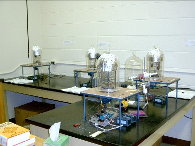 Mercuric iodide vertical growth furnaces used to produce large crystals. 