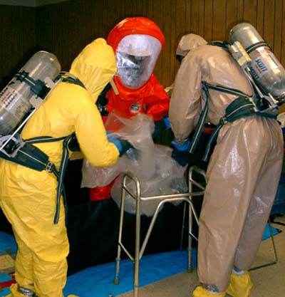 Special care must be taken to not spread any contamination.  The Level A suits are difficult to work in and require assistance when moving through decon.