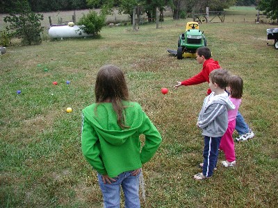 The Whaleys and Schinstocks engaged in a game of BocceBall. 
