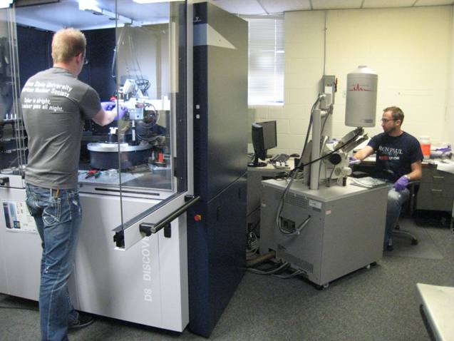 The scanning electron microscope (SEM) and x-ray diffractometer in the SMAL Lab. The scanning electron microscope is used to investigate materials and surfaces at the microscopic level. It has secondary and backscatter electron imaging capability. It also has X-ray flourescence capability that allows for the identification of the elemental constituents of a substance.  