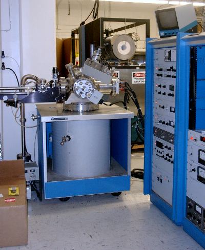 The Auger electron analysis system is used to excite characteristic Auger electrons from a material surface. These Auger electrons carry unique information that allows the operator to identify surface elements. The system comes with a sputter gun that allows the user to etch the surface during analysis, thereby allowing for depth profiling of a contact or surface layer. 