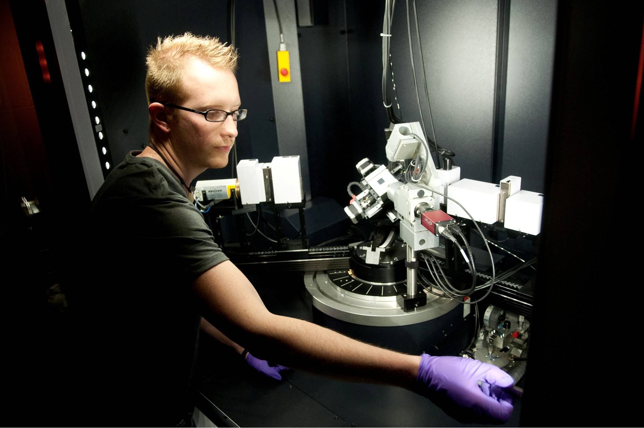 Ben Montag operates the Bruker D8 x-ray diffractometer, 